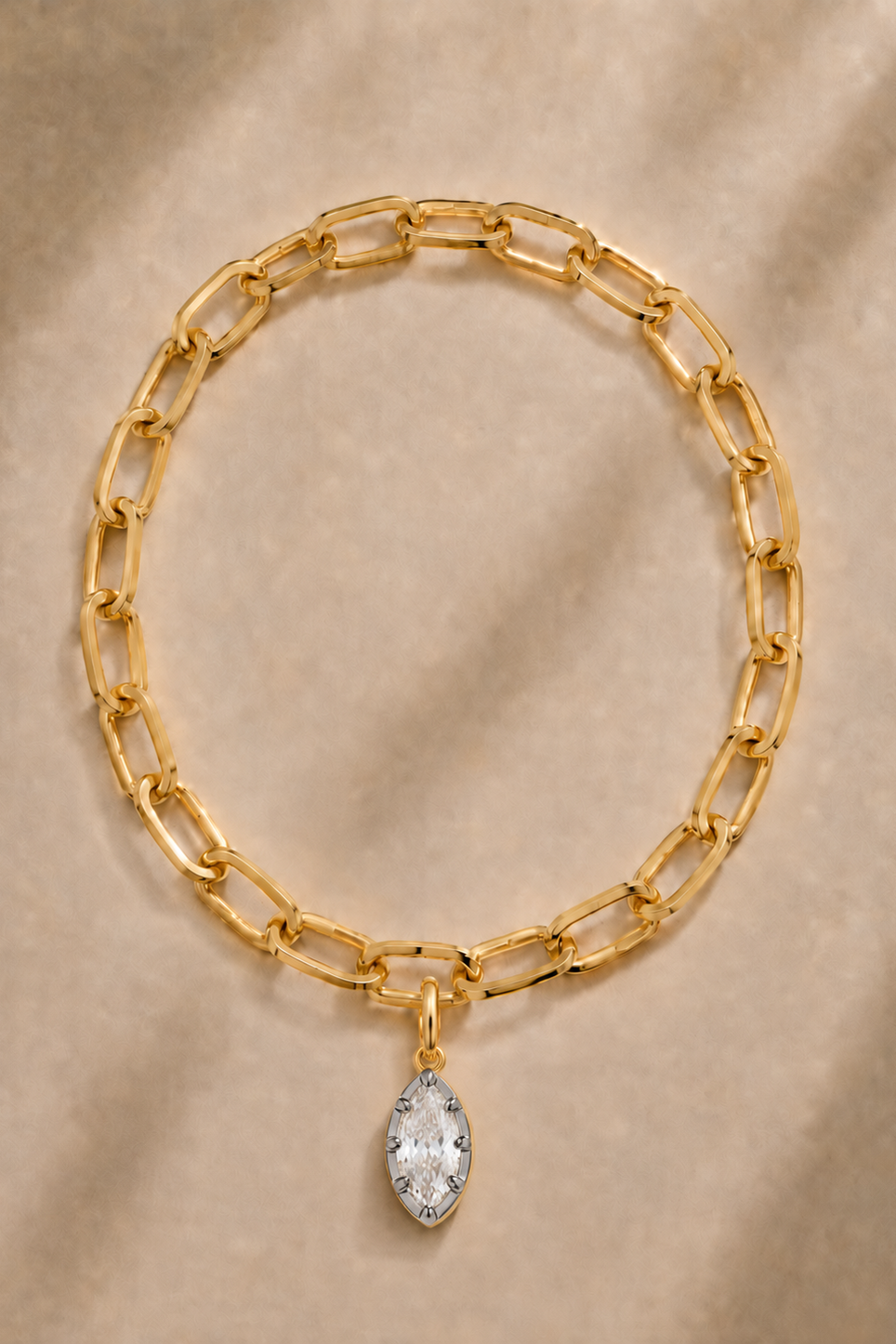 Cara chunky gold bracelet with Vittoria silver and gold marquise crystal charm