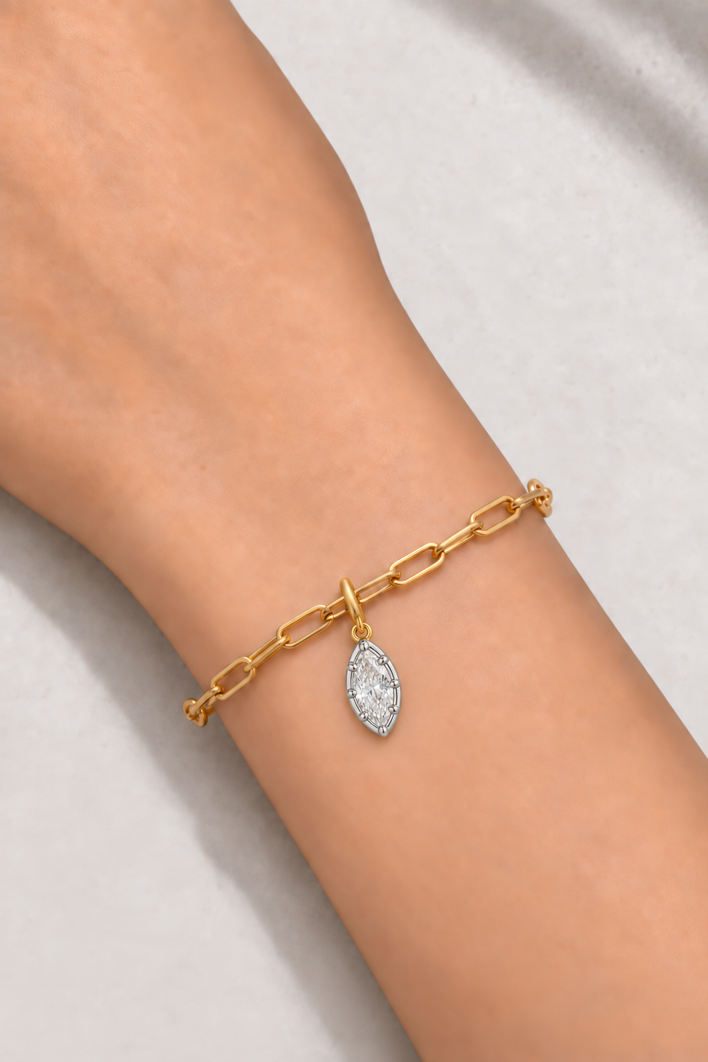 Gold paperclip bracelet with Vittoria silver and gold marquise crystal charm