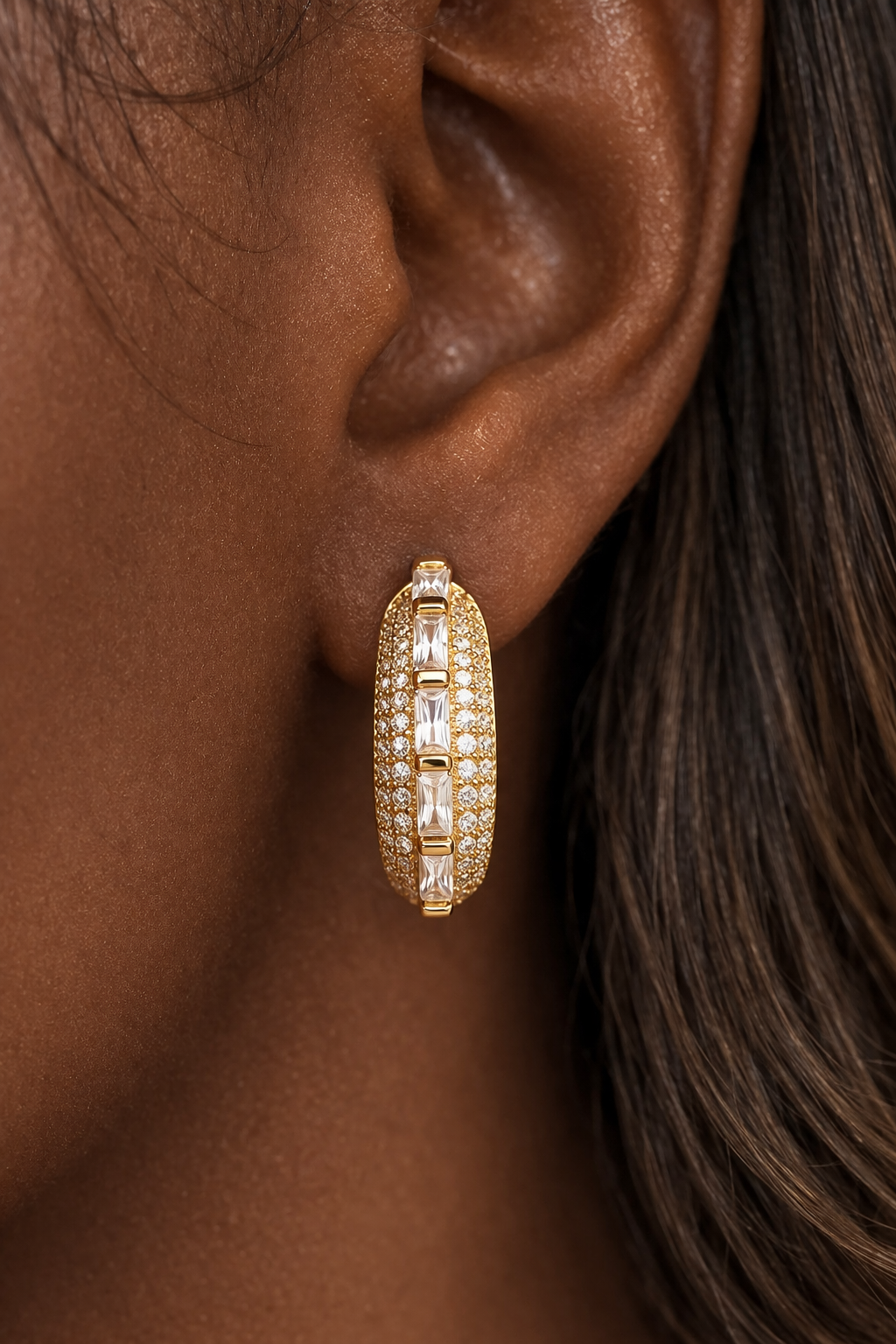 Front view of Arabella Mini Single Hoop on ear showing baguette stone row and pavé detail
