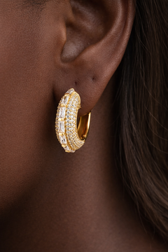 Arabella Mini Single Hoop worn on ear in 24ct gold plated 925 sterling silver with baguette and micro pavé stones