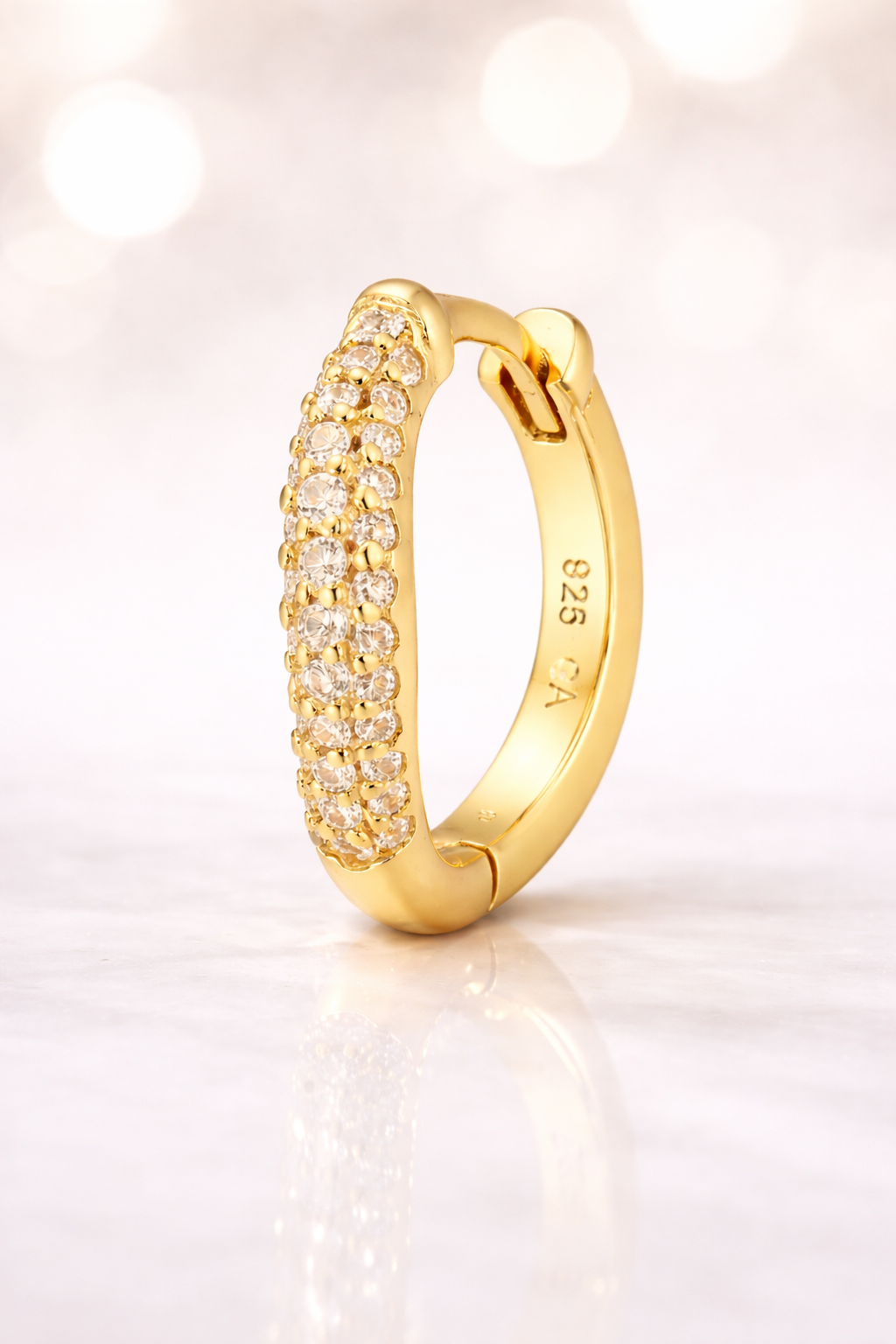 Aurora Kyma huggie earring in 24ct gold plated 925 sterling silver with pavé stones