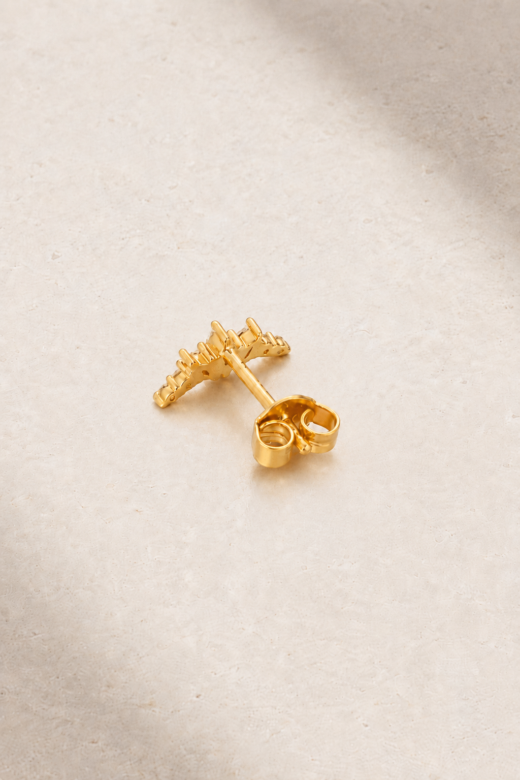 Back view of Couronne Gold Stud Earring with butterfly post fastening