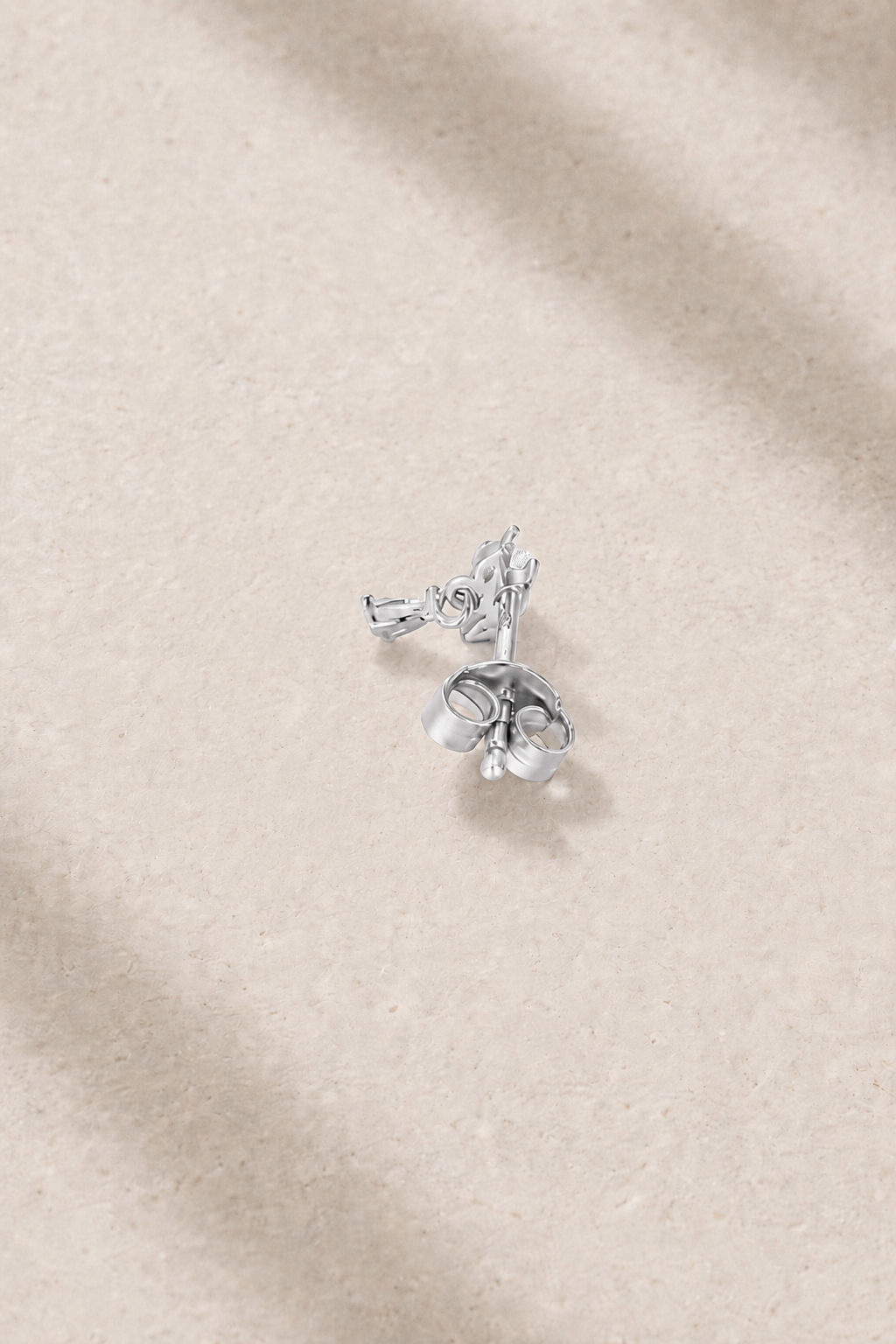 Back view of Fleur Silver Stud Earring with butterfly post fastening
