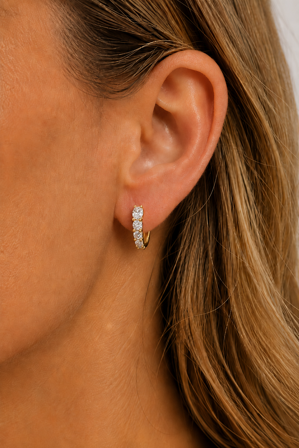 Gala Reverse Gold Huggie Earring 8.5mm worn on ear