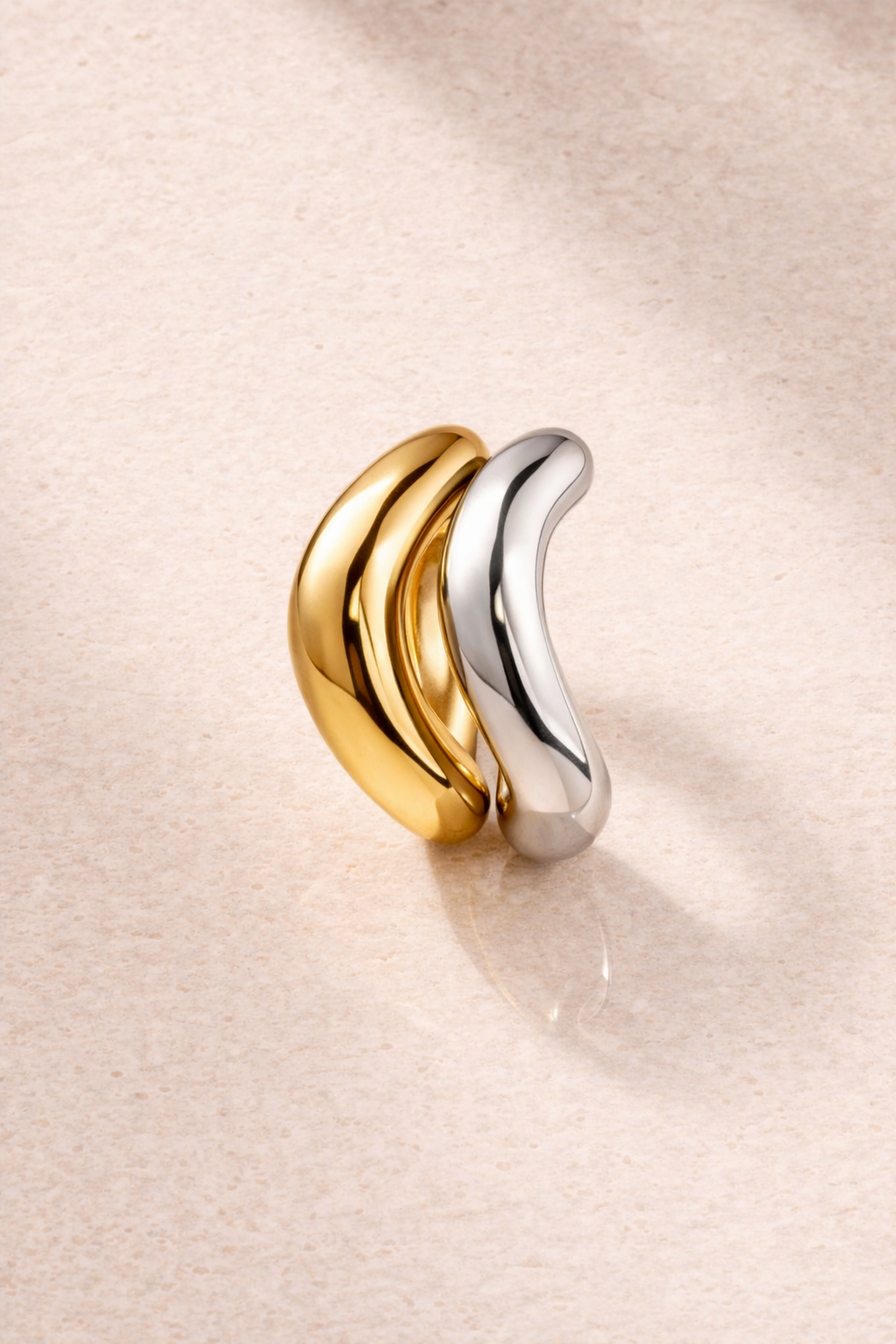 Kyma Ring Duo bundle with one gold vermeil wave ring and one sterling silver wave ring stacked together