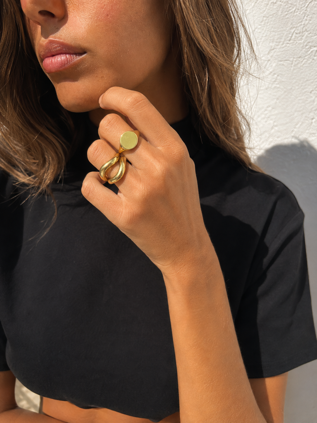 Sculptural gold ring stack styled by Galleria Armadoro with chunky Kyma rings and a polished Boheme statement ring.