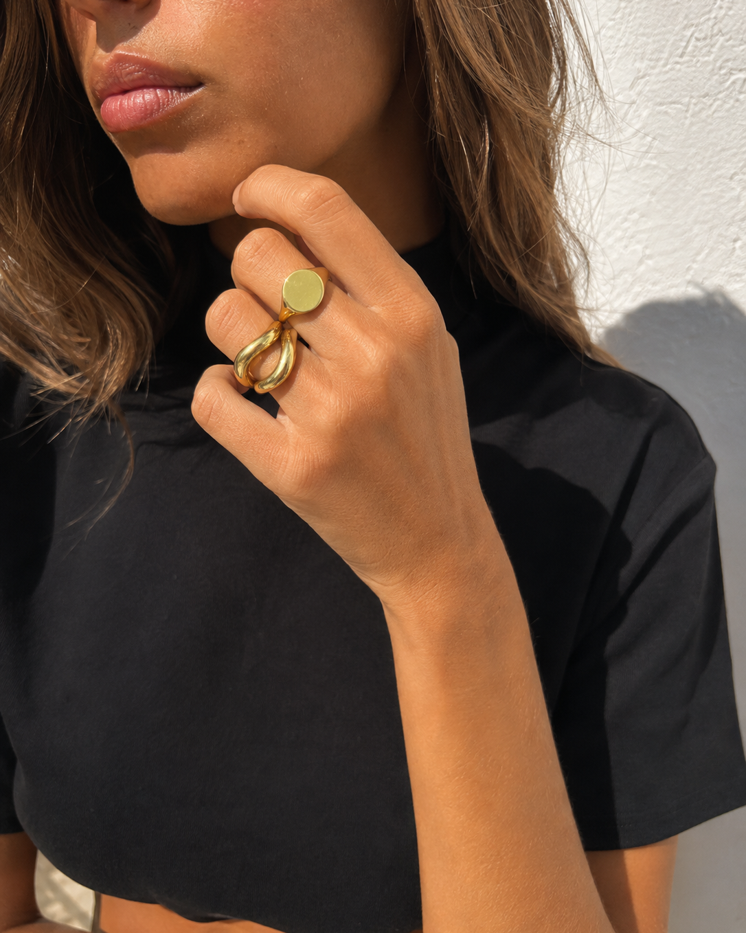 Sculptural gold ring stack styled by Galleria Armadoro with chunky Kyma rings and a polished Boheme statement ring.