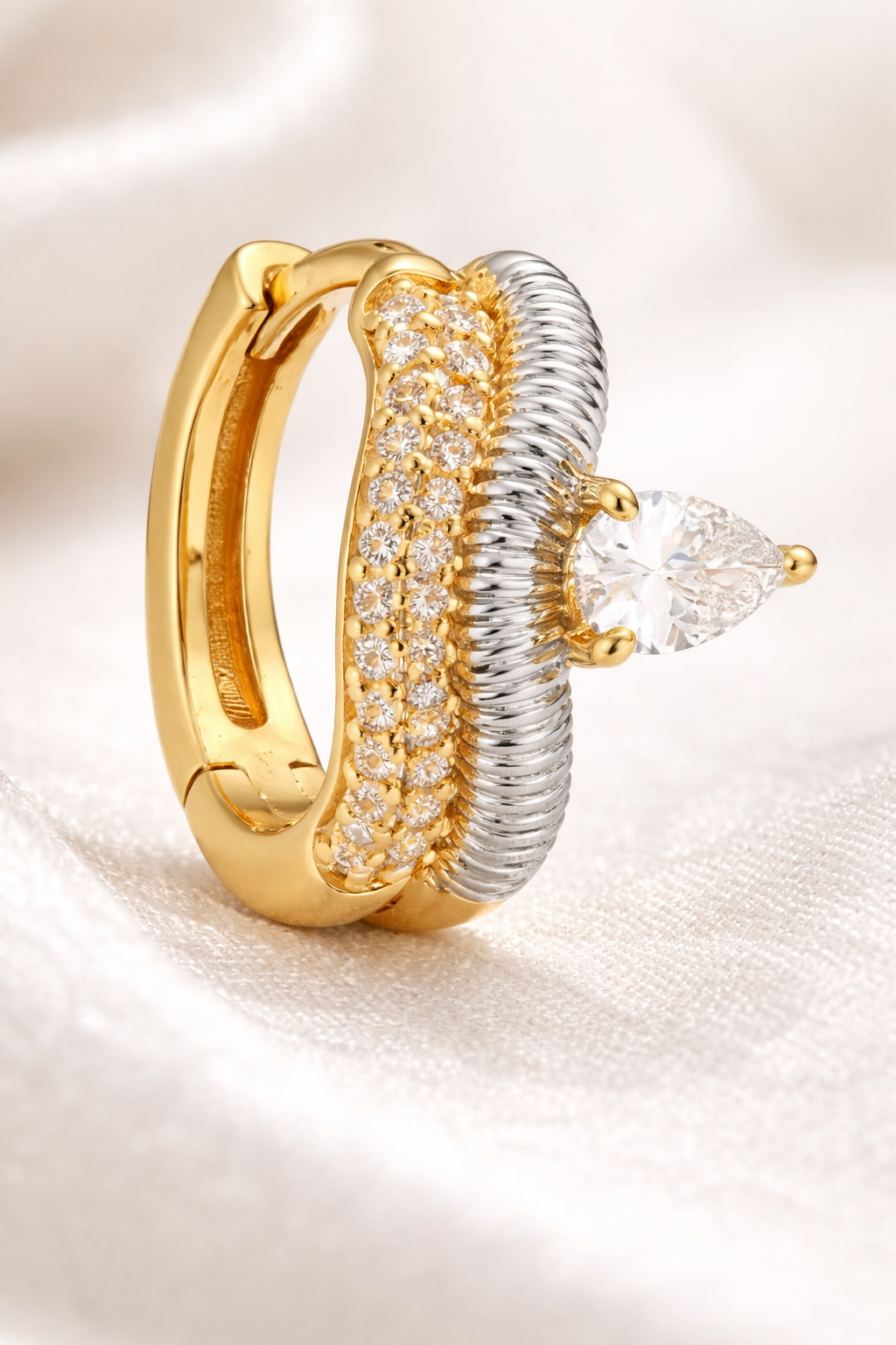 Side view Maura huggie earring 10mm inner diameter mixed metal gold and silver