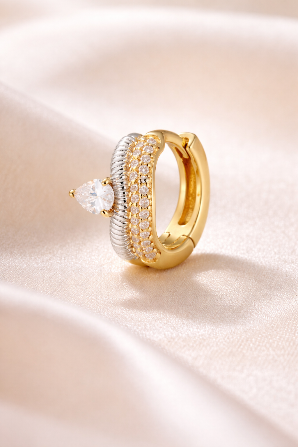 Close up Maura mixed metal huggie earring 925 sterling silver gold plating pavé stones