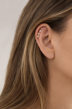 Close-up detail of Riviera Gold Ear Climber with pear, oval, marquise and round CZ stones