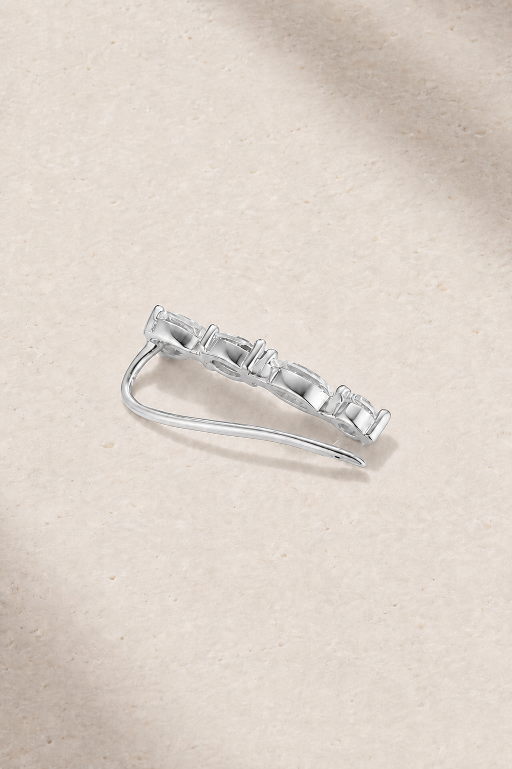 Riviera Silver Ear Climber worn on ear with sparkling white CZ stones