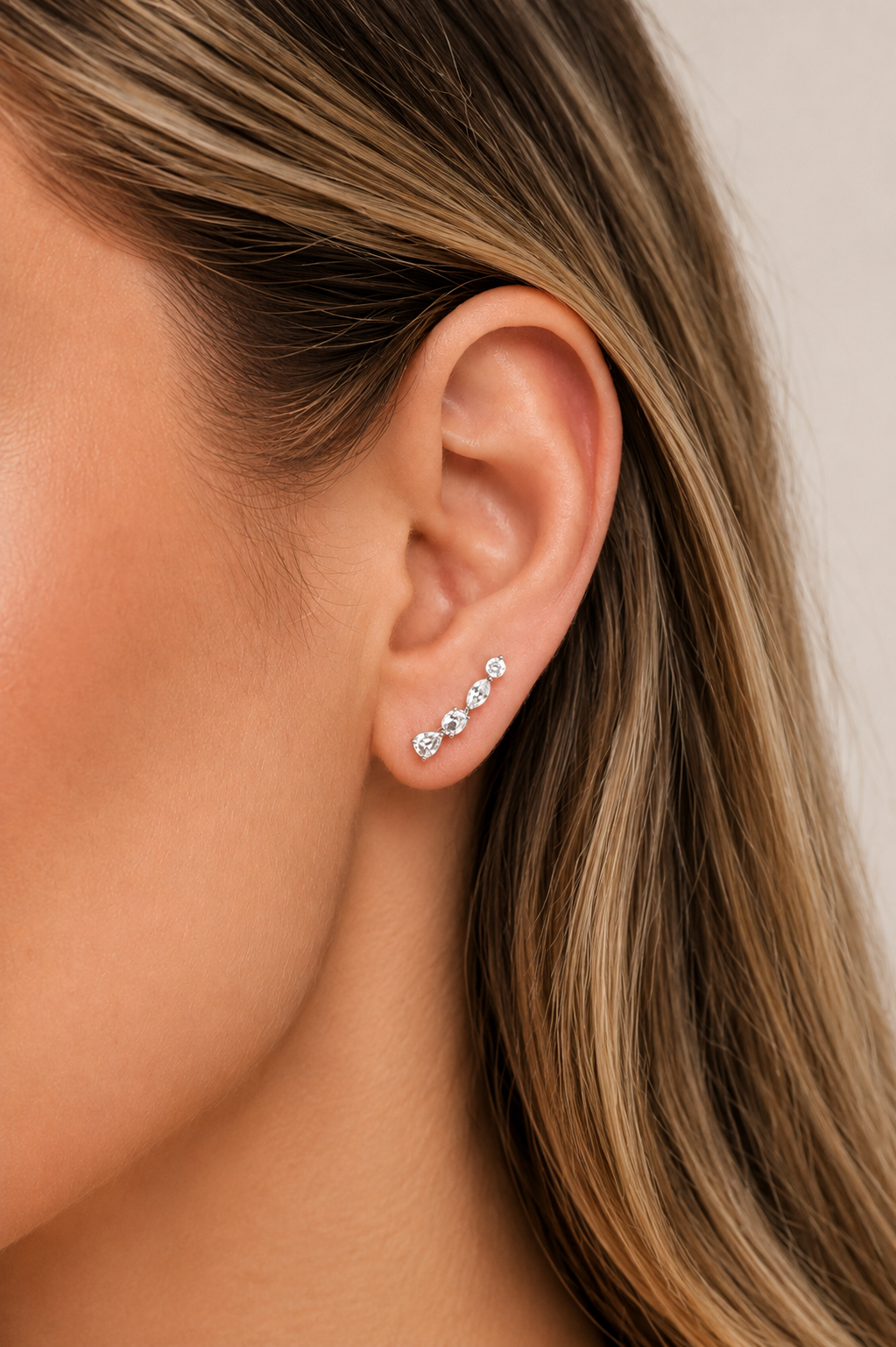 Riviera Silver Ear Climber worn on ear with sparkling white CZ stones