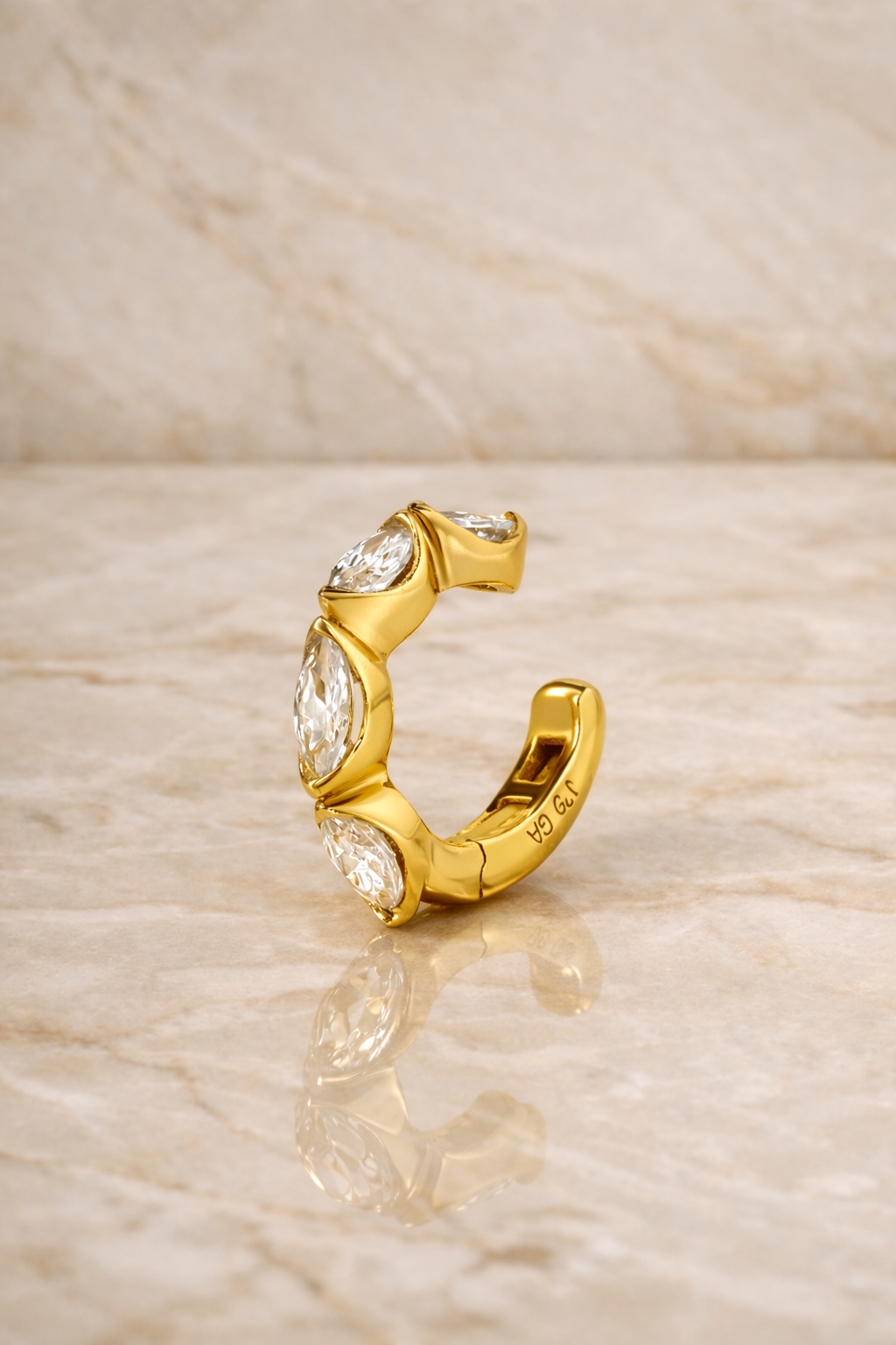 Tasha marquise gold vermeil ear cuff with white CZ stones front view