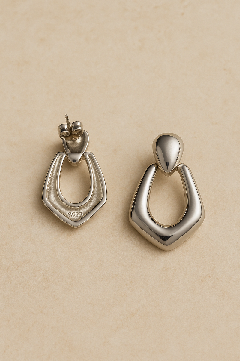 Back and angled view of Vera silver drop earrings with post and butterfly back