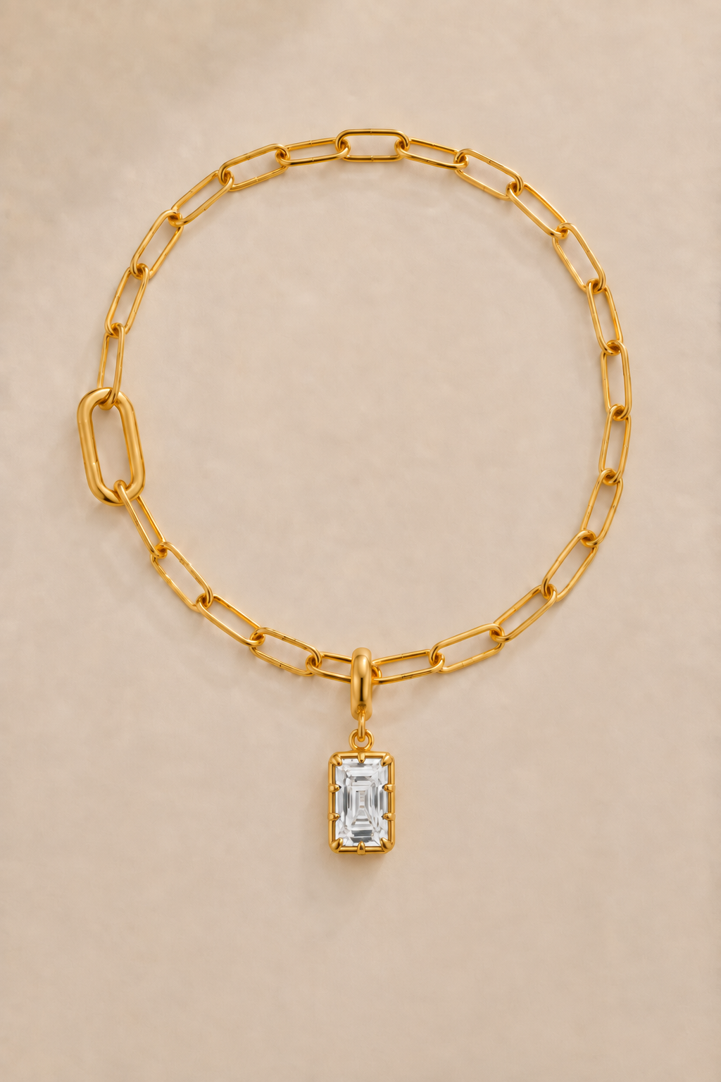 Vittoria Emerald Cut gold hook charm on the gold Large Link bracelet or anklet
