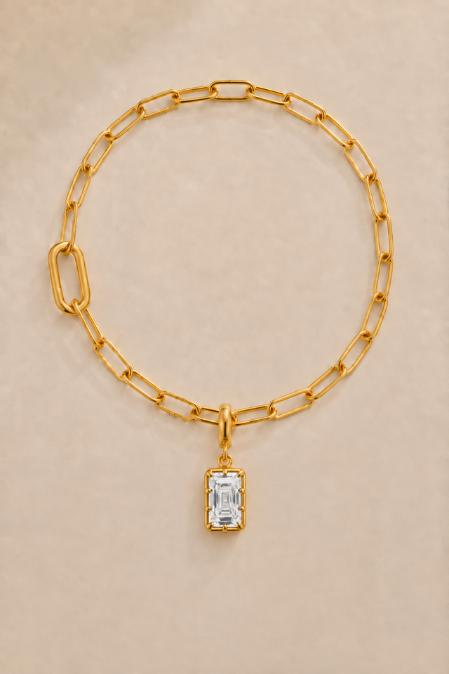 Vittoria Emerald Cut gold hook charm on the gold Large Link bracelet or anklet