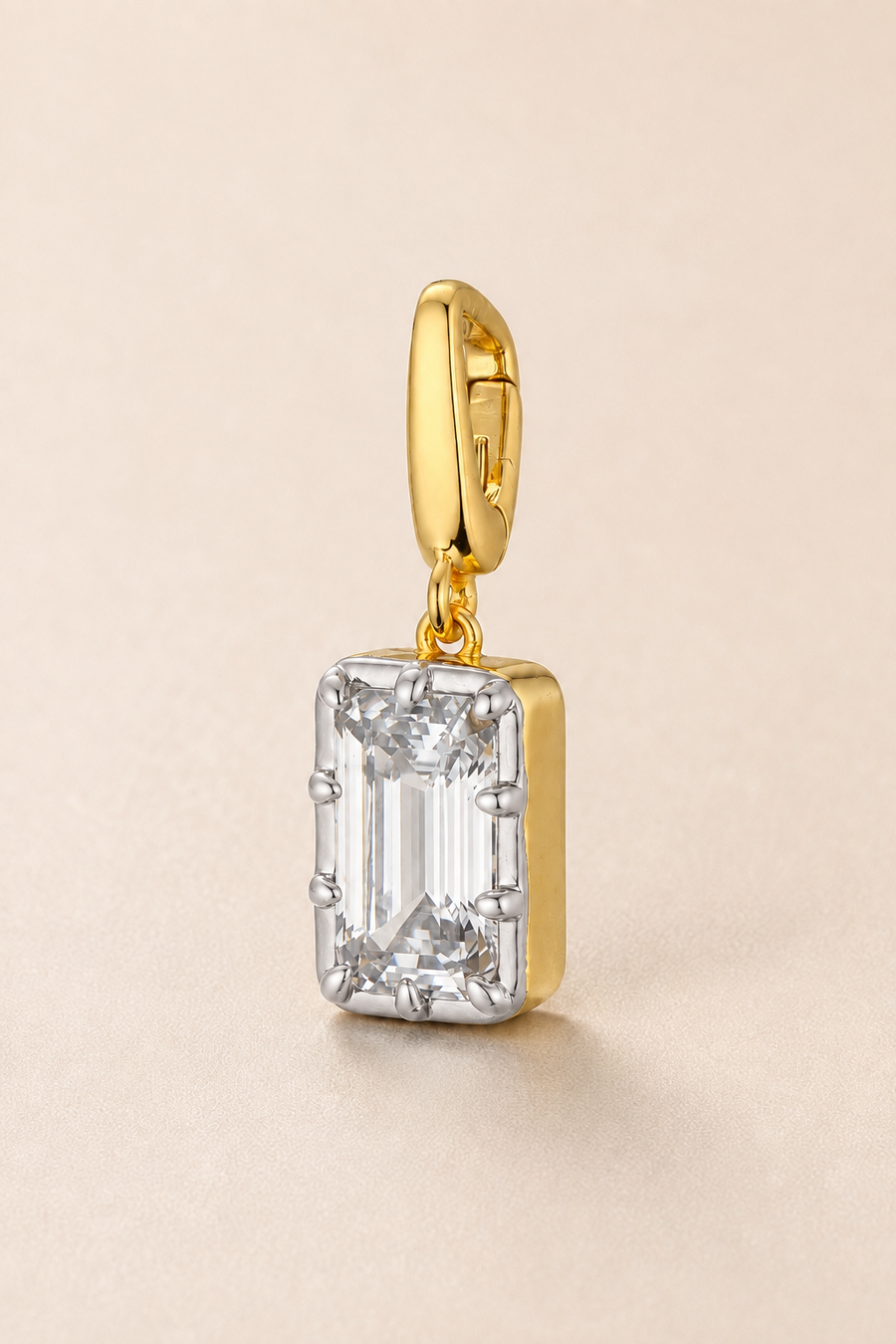 Vittoria emerald-cut hook charm in 24ct gold plating with white rhodium prong setting – front view