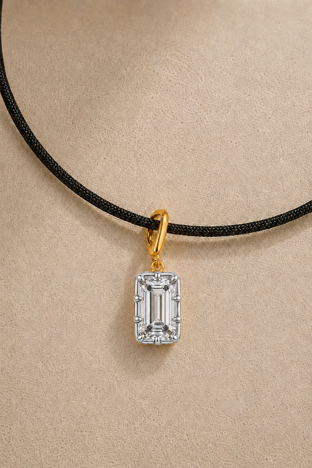 Vittoria emerald-cut silver and gold hook charm on adjustable black cord necklace – close-up
