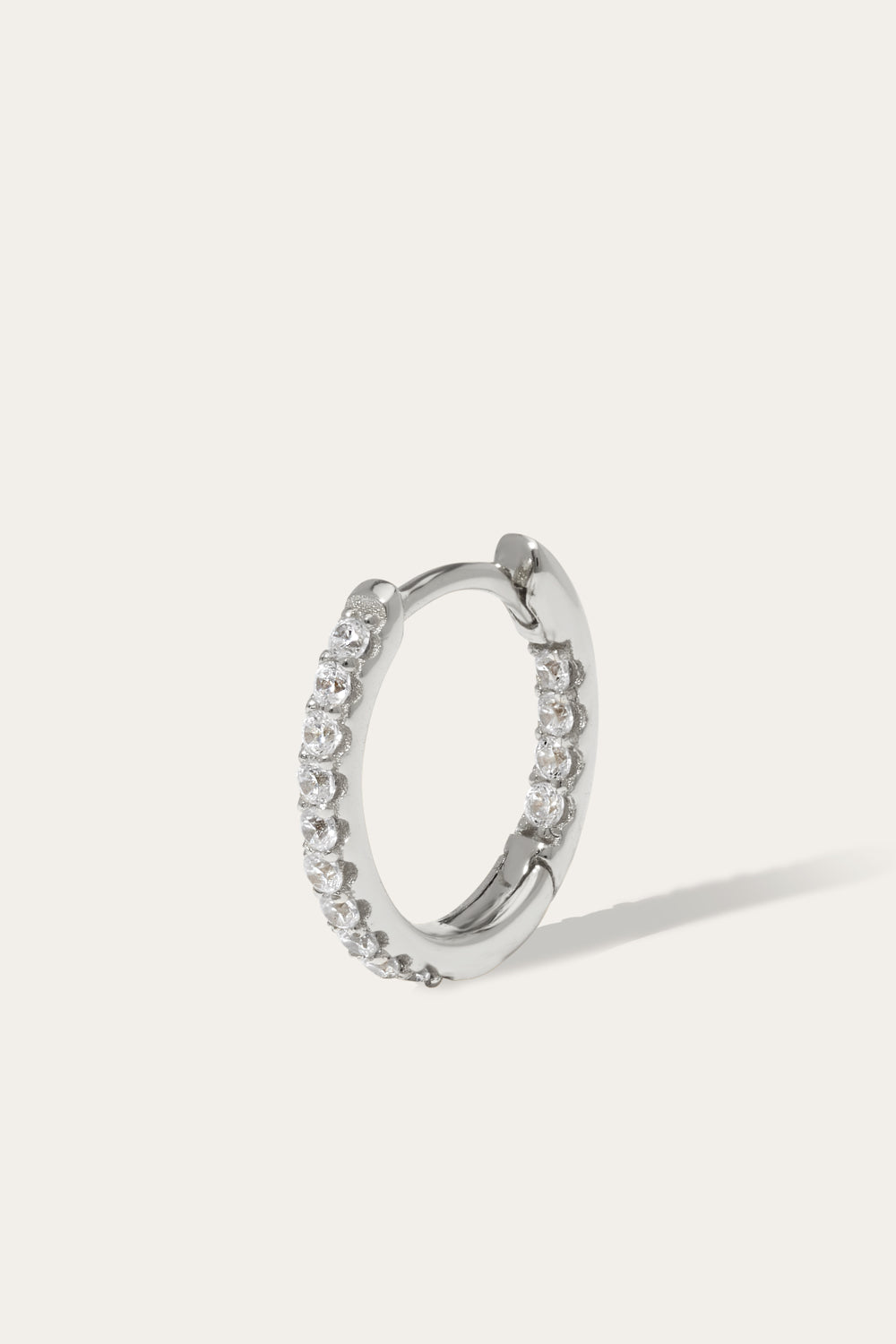 Oval sterling silver huggie