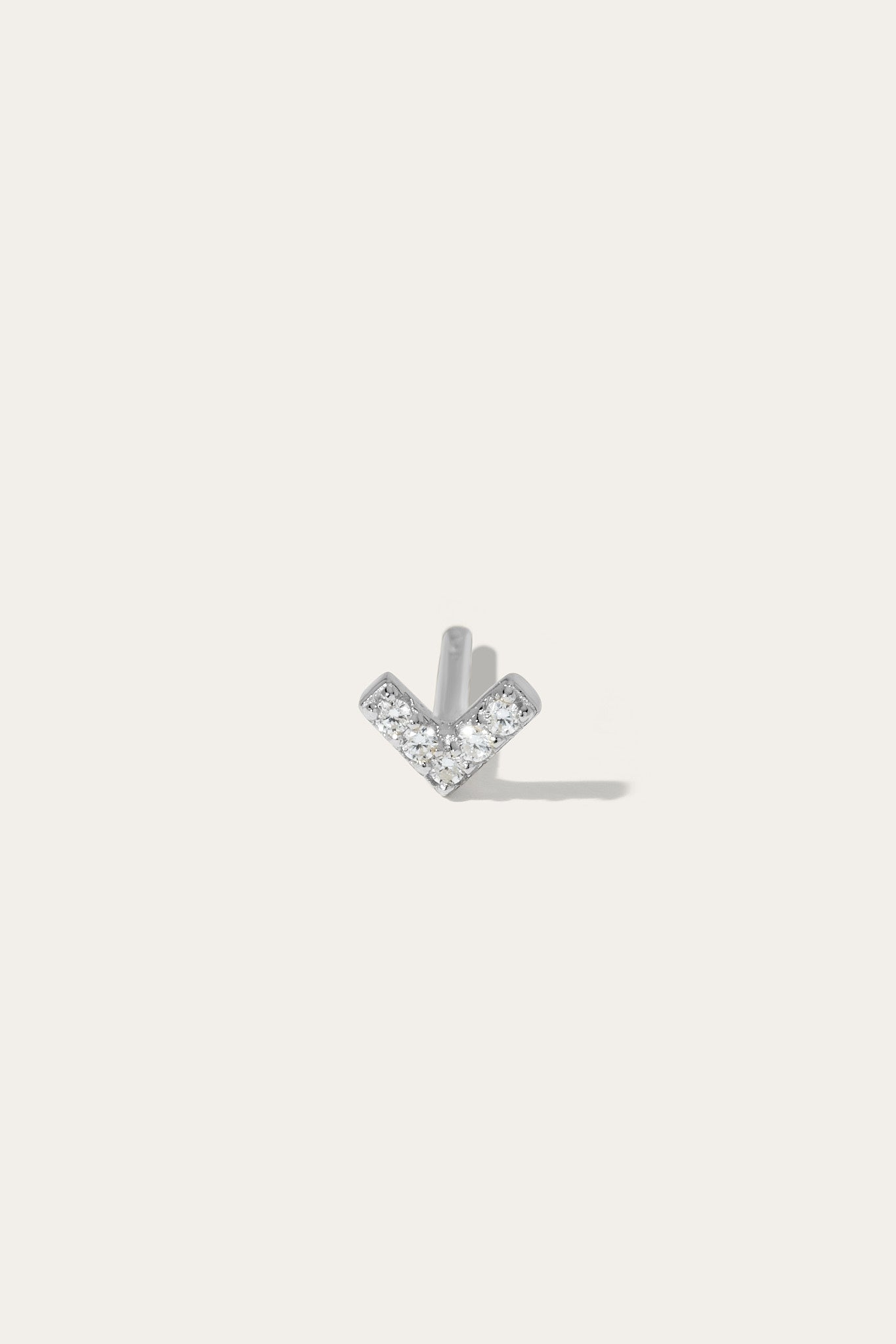 Vee silver stud