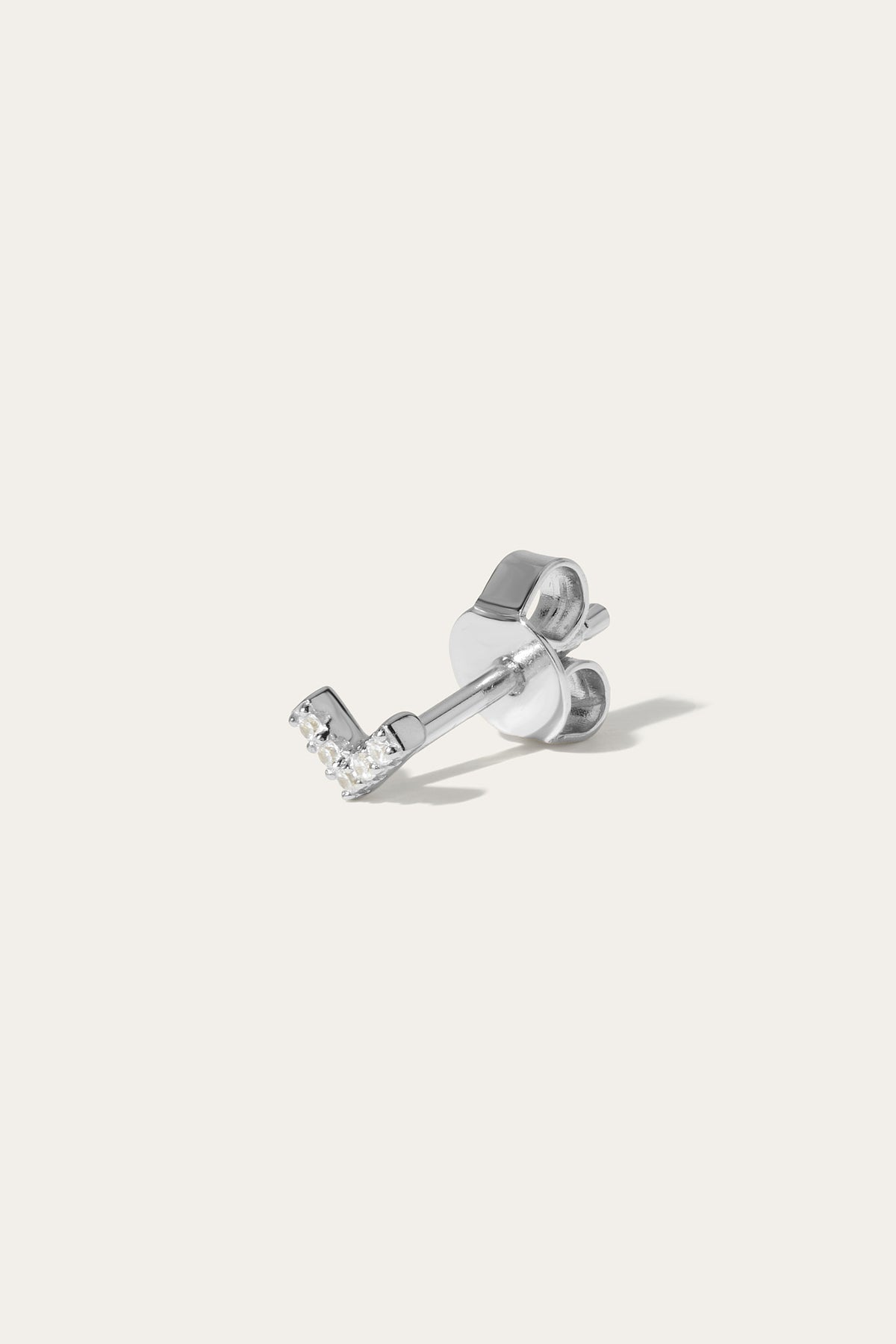 Vee silver stud